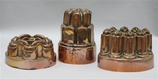 Three Victorian castellated copper jelly moulds